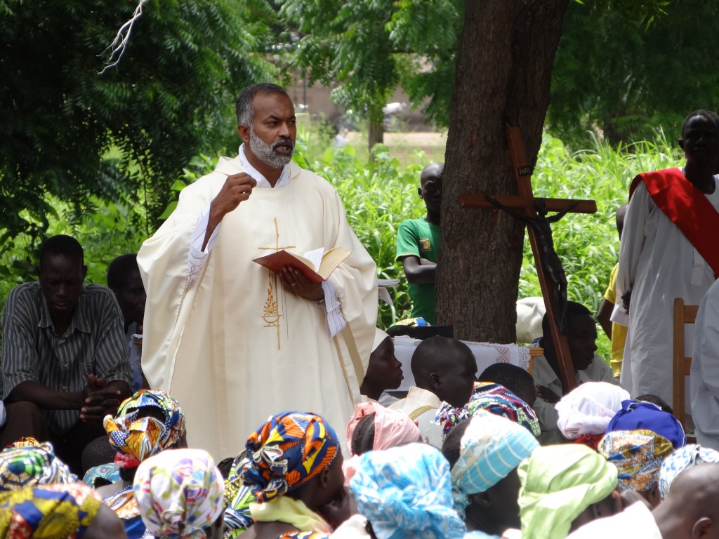Fr. George Palliparambil, PIME, preaches during a Mass in Cameroon. 