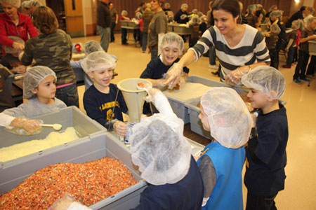 Students at St. Lawrence School in Utica spent the school day Jan. 15 packaging 30,000 meals as part of a campaign for Kids Against Hunger. The students also raised the money for the meals themselves.  