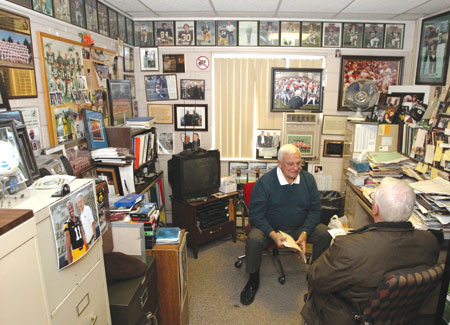 Retired Brother Rice football coach Al Fracassa sits down with a Michigan Catholic reporter in his office, every square inch of which is covered with memorabilia from his 54-year coaching career. 