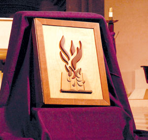 The Book of the Elect sites in the sanctuary at the Cathedral of the Most Blessed Sacrament. 