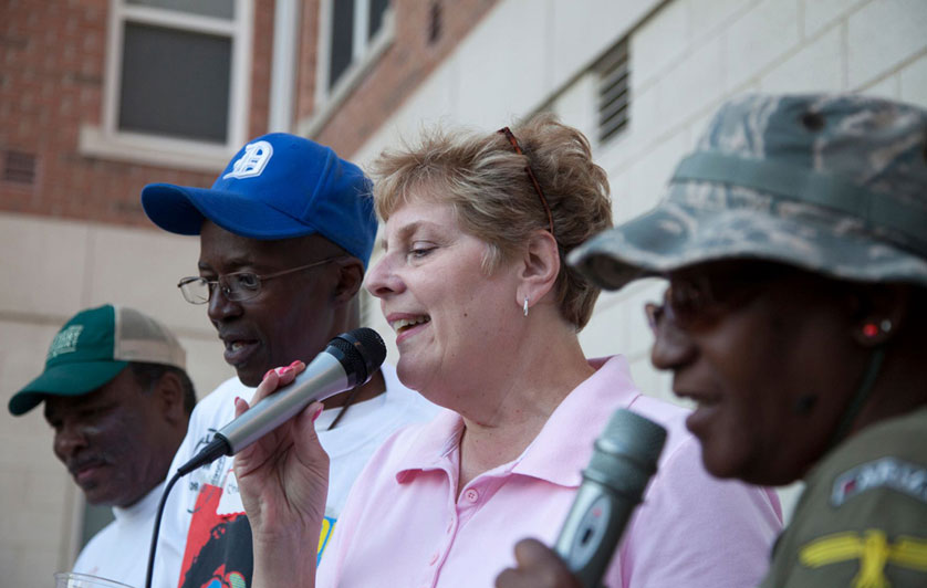Chery Allen, veterans resource facilitator at Piquette Square, sings karaoke with veterans Charles Hinson and Odester Lawarence during an event last year. 