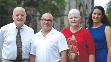 Detroit Mass Mob organizers, left to right, Thom Mann, Anthony Battaglia, AnnaMarie Barnes and Teresa Chisholm stand outside St. Joseph Church. Not pictured is Jeff Stawasz.             