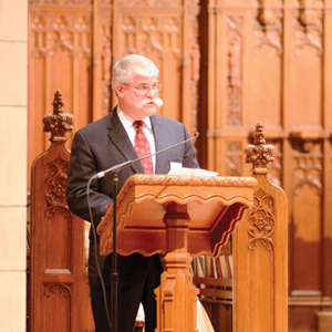 John Sier speaks during the 2013 Mass for Commerce at Sacred Heart Major Seminary. Sier, who co-chairs the annual event, said the Mass is a great chance for Catholic professionals to meet. 