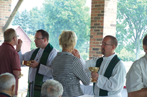 Fr. Robert Slaton, left, and Fr. Stephen Rooney of Our Lady on the River Parish in Marine City are responsible for managing three worship sites and a school. 