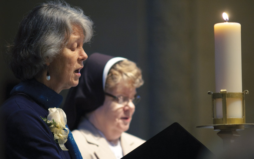 Sr. Angela Hibbard, IHM, left, pastoral associate at Gesu Parish in Detroit, sings with other men and women religious during an archdiocesan event in 2011. Many local religious orders are planning events and activities during the “Year for Consecrated Life,” which Pope Francis has designated for Nov. 30, 2014, to Feb. 2, 2016.  