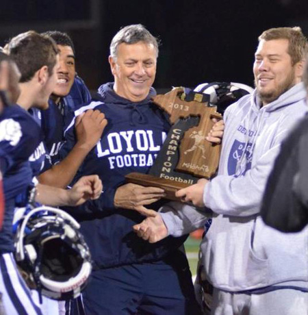 John Callahan, coach of the state champion Loyola Bulldogs, has molded his team into a “family.” 