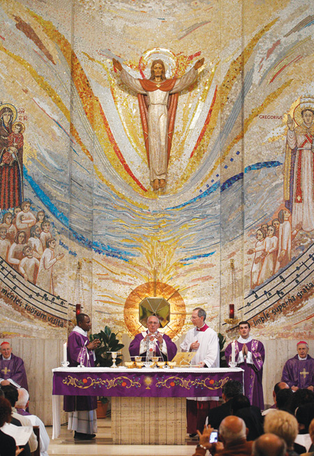 Pope Francis celebrates the Eucharist at the Church of St. Gregory the Great in Rome April 6. (CNS photo/Paul Haring) (April 7, 2014) See POPE-PARISH April 7, 2014.