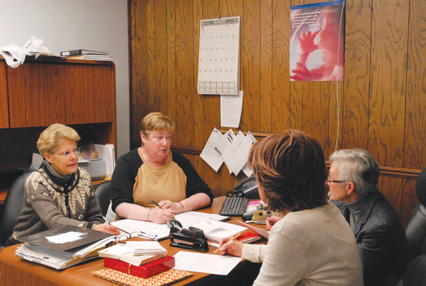 Members of the Michigan Nurses for Life, based in Troy, talk during a meeting Jan. 14. Clockwise, starting at left, are Linda Seng, organization president Diane Trombley, Ann Bellar and Phyl Sallee.