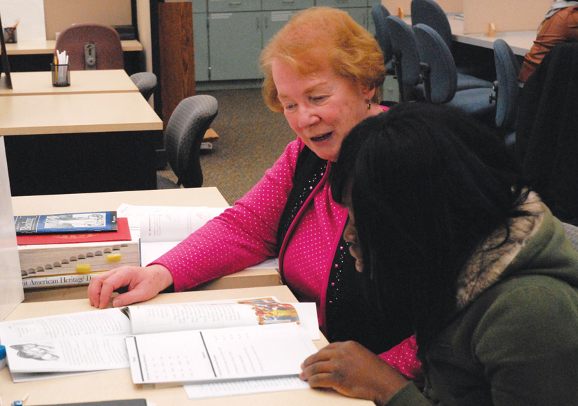Student Tyisha Boykins, right, works with her tutor, Sr. Ellen Burkhart, OP, at the Dominican Literacy Center, which recently moved into the Samaritan Center on Conner Avenue from its former home in the Warren-Conner complex on Harper Avenue. 