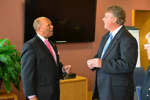 University of Detroit Mercy president Antoine M. Garibaldi, left, talks with Archdiocese of Detroit superintendent Brian Dougherty about the benefits U-D Mercy can provide archdiocesan teachers via a new professional development initiative. 