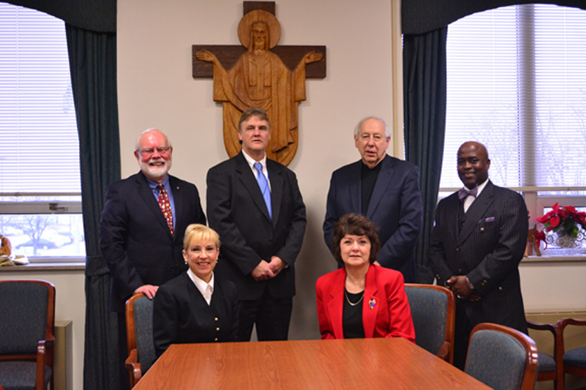 Archdiocese of Detroit and Madonna University officials meet Dec. 10 to discuss a new professional development initiative in which the university will help provide training for Catholic school teachers in the archdiocese’s Central Region. 