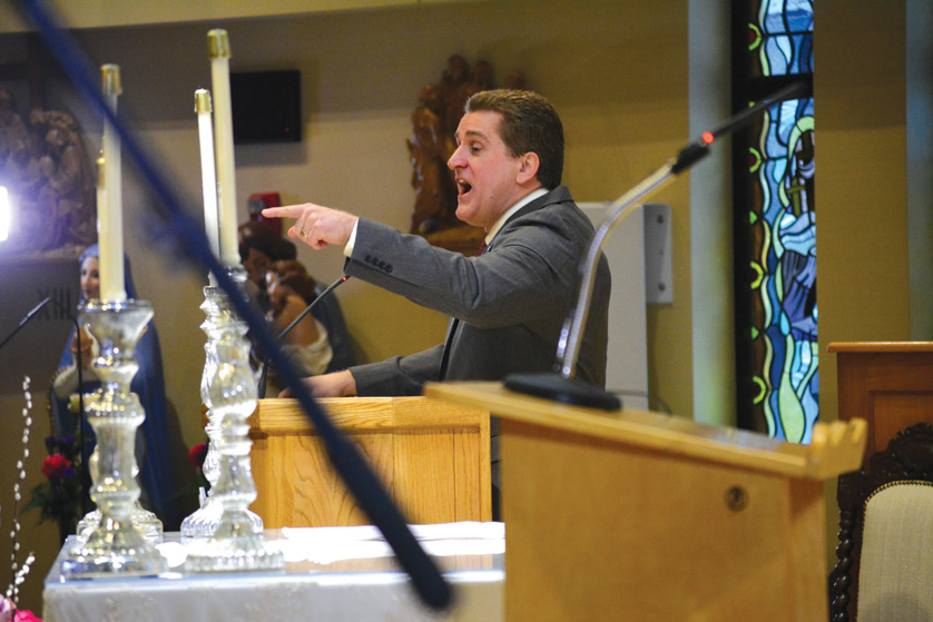 Catholic apologist Tim Staples gives a spirited explanation of the Catholic understanding of purgatory during the Midwest Catholic Apologetics Conference at SS. Cyril and Methodius (Slovak) Parish, Sterling Heights, on Jan. 24. The second annual conference helped Catholics learn to explain and defend Church teaching against a range of common objections to the faith. 