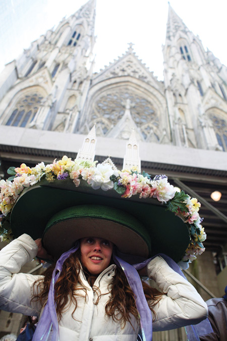 A young woman dressed in costume parades down Fifth Avenue during the annual Easter Parade outside St. Patrick's Cathedral in New York, April 12. (CNS photo/Patrick Andrade, Reuters) (April 13, 2009)