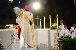 Archbishop Allen Vigneron incenses the altar at the start of a Mass of thanksgiving April 22 at the National Shrine of the Little Flower Basilica to celebrate the granting of its new title and responsibilities as a church is special connection with the Holy Father and the See of Rome. (Photos by Mike Stechschulte, The Michigan Catholic)