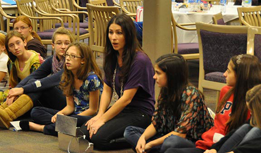Chelsea Gheesling, founder of the Good Girl Comeback, answers questions at a seminar for middle school girls.