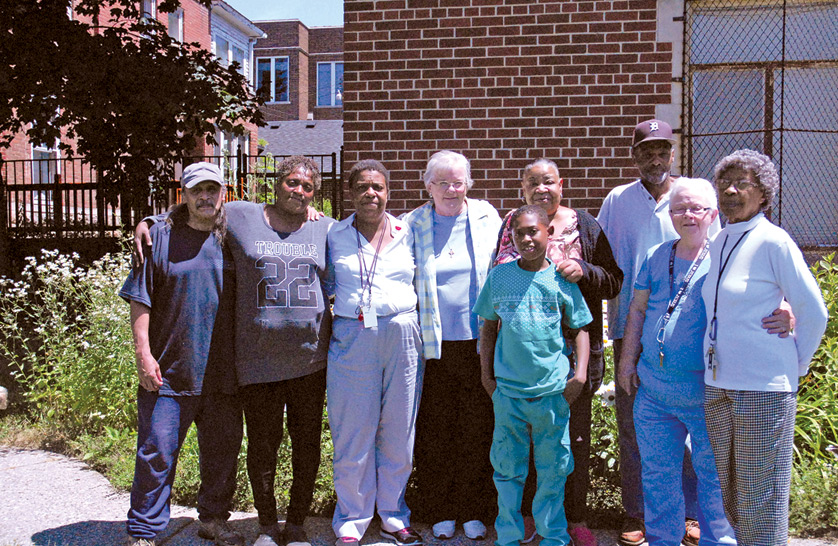 Sr. Peggy Devaney, IHM, (middle) is a chaplain of the Pontiac Area Vicariate's Jail and Outreach Ministry. Sr. Devaney works with convicts and victims of crime in trying to restore their lives.