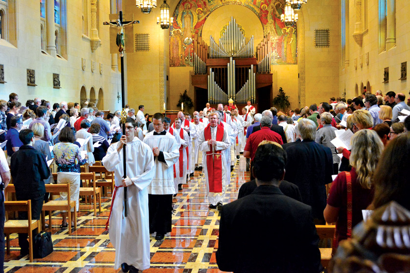 Clergy from dioceses across the country process out of the chapel at the Inn at St. John's in Plymouth during the opening Mass of a three-day conference Aug. 10-12 exploring the Church's ministry to those living with same-set attraction. The international conference featured more than 30 speakers and was co-sponsored by Courage and the Archdiocese of Detroit.