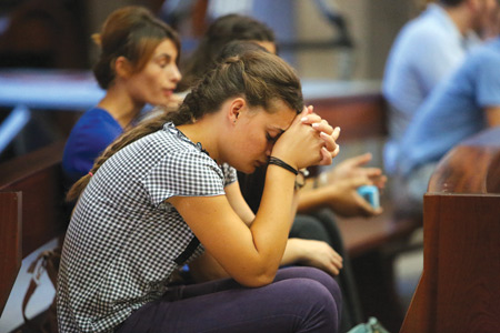 Prayer can either be vocal, such as in reciting the Our Father or Hail Mary; mental, including meditation and spontaneous dialogue with God; and contemplation, which is a gift described as a "silent communing with God in love."