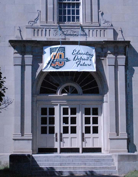 A banner celebrating Gesu School's 90th anniversary hangs from the school building in northwest Detroit.