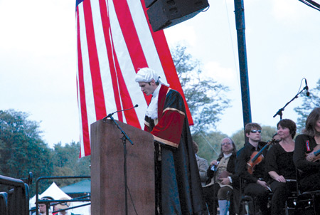 A re-enactor portrays John Jay, the first chief justice of the U.S. Supreme Court, talking about religious liberty during "We Humble Ourselves," a patriotic event Aug. 29 in Dearborn.