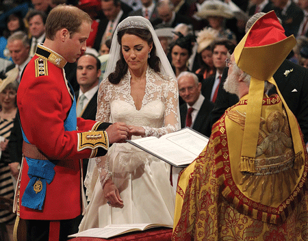 Britain's Prince William and Kate Middleton exchange rings during their wedding ceremony in 2011. Dominic Lipinski | CNS Photo