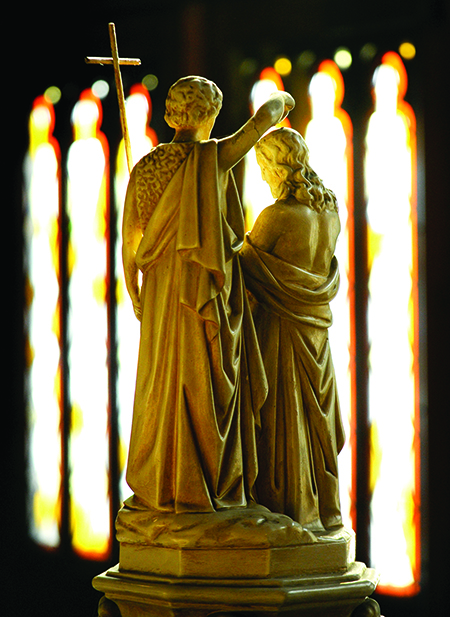 A statue of Jesus and St. John the Baptist is seen in the narthex of Our Lady of the Americas Church in Rochester, N.Y. (CNS photo/Mike Crupi, Catholic Courier) (Oct. 20, 2009)