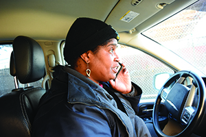Stephanie Taylor, Covenant House outreach manager, answers a call from a young person who needs shelter and care at Covenant House in Detroit.