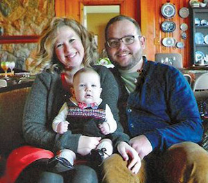 Knights of Columbus member Adam Wit is pictured with his wife, Sarah, and 8-month-old son, Ezra.  Courtesy of Susan Wit