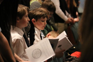Students sing during Mass at the Cathedral of the Most Blessed Sacrament.