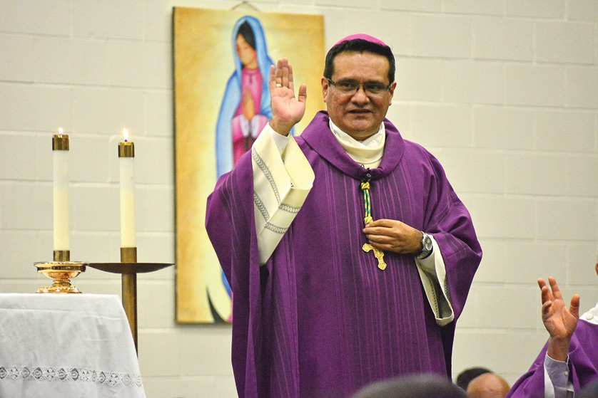 Auxiliary Bishop, Arturo Cepeda speaks to young people during Mass at the Hispanic Youth Conference. Photos by Mike Stechschulte | The Michigan Catholic