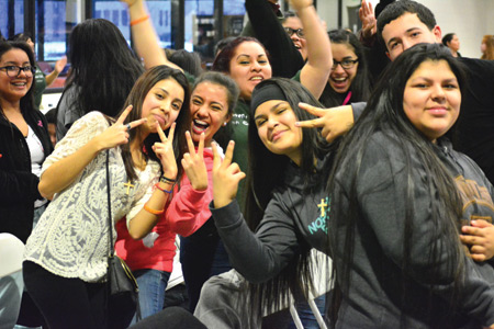 Young people pose for a photo during the Hispanic Youth Conference at the University of Detroit Mercy on March 5. More than 900 Hispanic young people from across the Archdiocese of Detroit attended the daylong Spanish-language gathering for fellowship and faith building. Photos by Mike Stechschulte | The Michigan Catholic