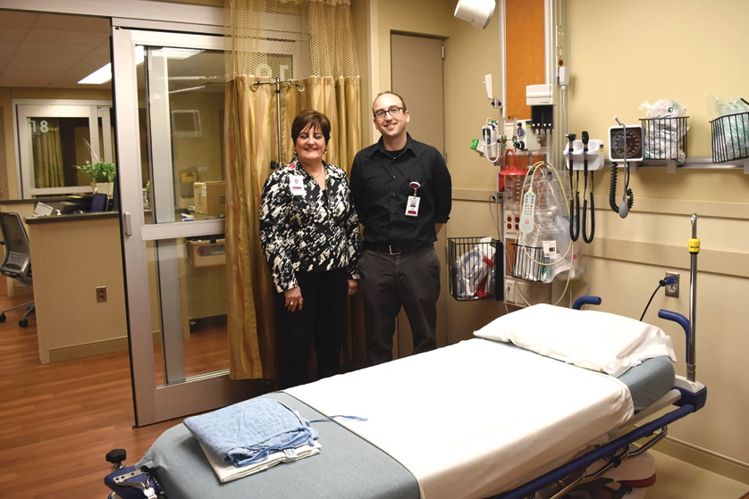 Karen Bostick, RN, director of the emergency center at St. Mary Mercy Hospital in Livonia, and Dustin Deriemacker, RN, nursig manager of the emergency center, stand in the senior emergency center at the Livonia hospital. The senior emergency center is one of the first in the state specifically tailored to seniors and their families. Photos by Dan Meloy | The Michigan Catholic