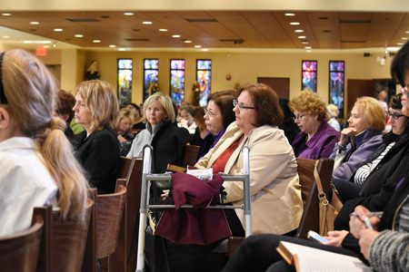 People listen as speakers discuss the meaning of God's mercy at the 19th annual Lenten Symposium sponsored by Holy Trinity Apostolate at SS. Cyril and Methodius Parish in Sterling Heights on March 12. Dan Meloy | The Michigan Catholic