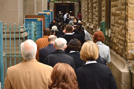 Pilgrims make their way through the Holy Door at the Cathedral of the Most Blessed Sacrament in Detroit. Mike Stechschulte | The Michigan Catholic
