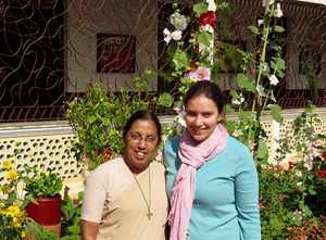 Annie Bennett, Michigan Catholic Conference communications and outreach associate, stands with Sr. Charmaine outside St. Joseph Convent School in Panchgani, India.
