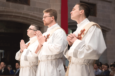 From left, Fr. Timother Wezner, Fr. David Tomaszycki, and Fr. Kevin Roelant were among five new priests ordained May 14 for the Archdiocese of Detroit.