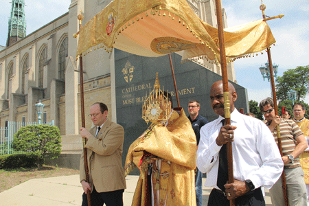 In the Feast of Corpus Christi, Christ shows he is present to the world through the "ordinary 'stuff' of creation," Archbishop Vigneron said, signifying that he will redeem every part of creation.