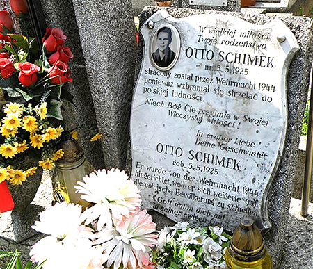 The tombstone of Otto Schimek, who was executed by his own Nazi forces for refusing to kill Poles during World War II, is seen in this photo from Machowa, Poland. Schimek was just 19 years old, but continues to be seen as a witness to peace for Polish Catholics today.