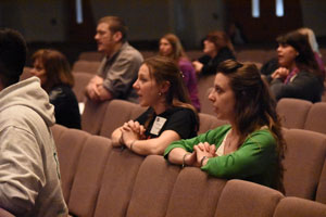 Young adults attend a conference in April at St. John Neumann Parish in Canton. For many young adults, “parish hopping” to experience multiple church environments can be the norm, but it can come with drawbacks, local pastors say.  Dan Meloy | The Michigan Catholic