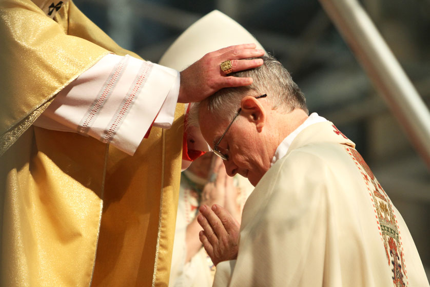 Cardinal Timothy M. Dolan of New York lays hands on Auxiliary Bishop Peter J. Byrne during his episcopal ordination at St. Patrick's Cathedral in New York in 2014. The laying on of hands goes back much further than even the New Testament, lending light to the earliest Christians’ understanding of the sacrament of holy orders. Gregory A. Shemitz |CNS Photo