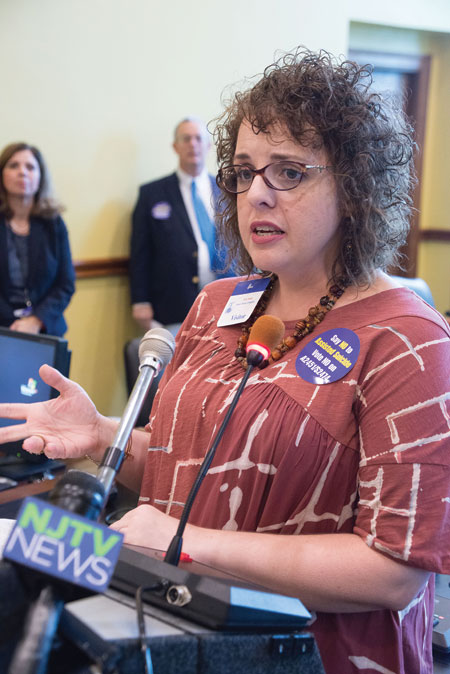 Sarah Steele speaks during a news conference Oct. 20 in the New Jersey State House Annex in Trenton about her battle with terminal brain cancer and the fact that she is alive 10 years after she was only given months to live. Steele was among a nearly dozen people to speak at the news conference against assisted-suicide legislation that is pending in Trenton. (CNS photo/Joe Moore, Catholic Monitor) See ASSISTED-SUICIDE-CANCER-SURVIVOR Oct. 31, 2016. 