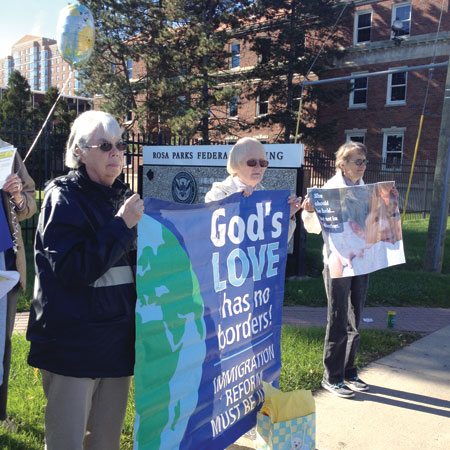 Mercy sisters protest outside of the Rosa Parks Federal Building in Detroit over what the sisters say are unjust policies toward undocumented immigrants. (Courtesy of Sisters of Mercy)